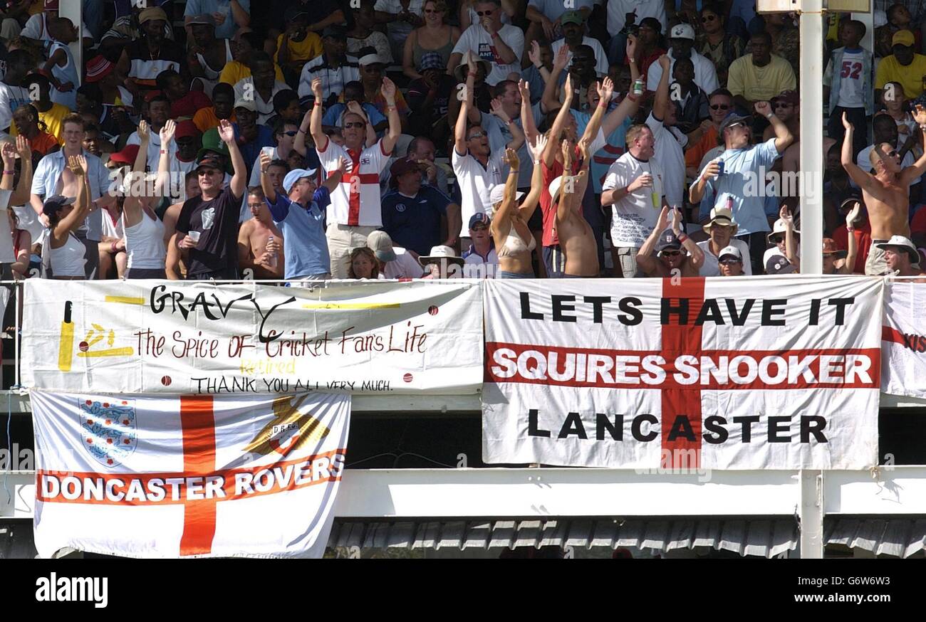 The Barmy Army sing in the stands, during the third day of the 4th Test at the Recreation ground, St John's, Antigua. Stock Photo