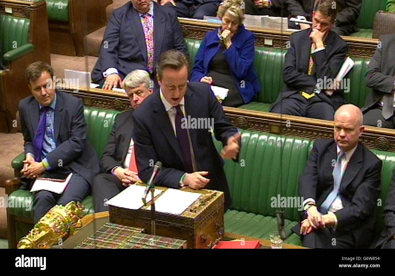 Prime Minister David Cameron reads a statement in the House of Commons, London, regarding the crisis in Ukraine. Stock Photo