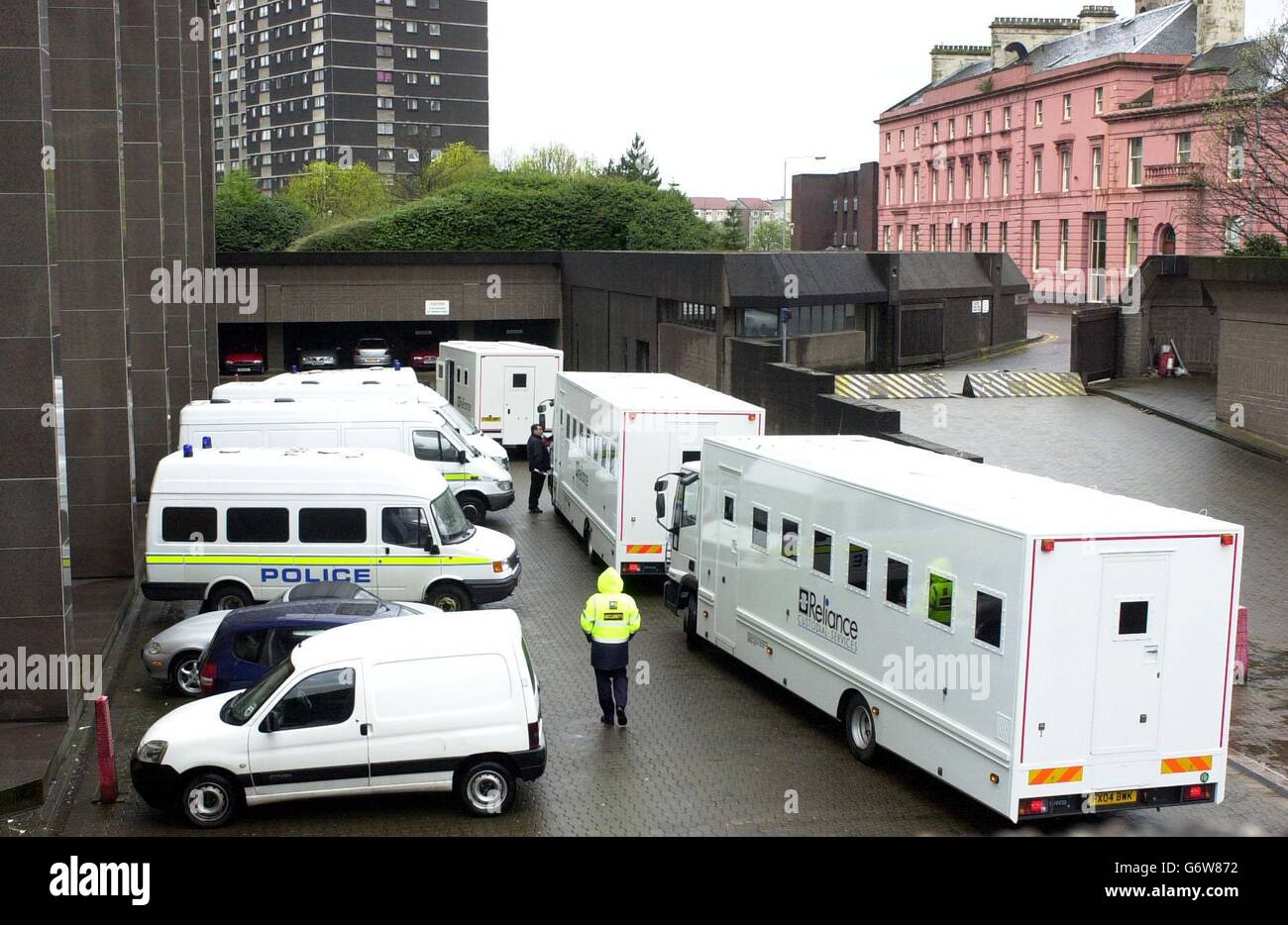Reliance Custodial Services vans arrive at Glasgow Sherrif Court. They are at the centre of