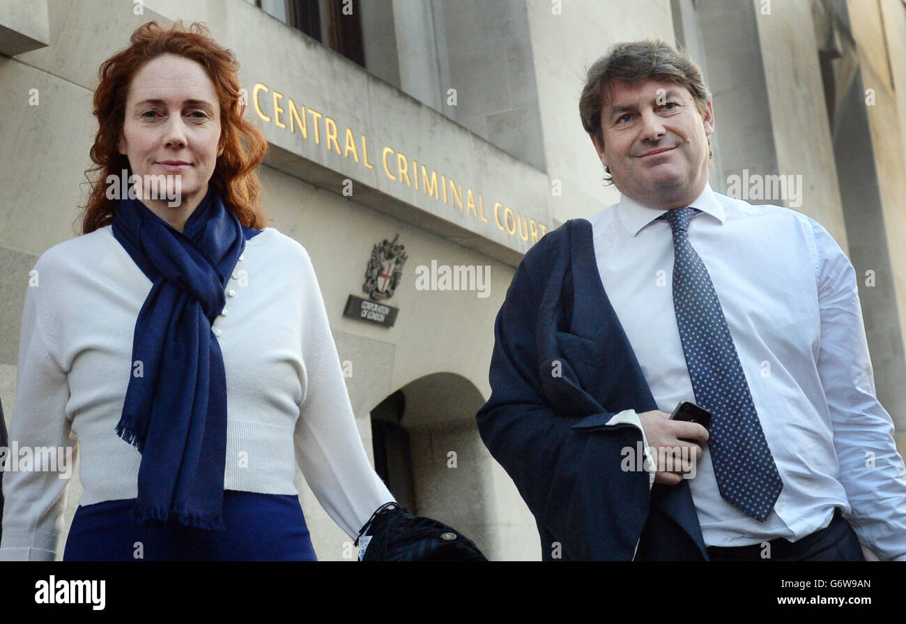 Former News International chief executive Rebekah Brooks and her husband Charlie Brooks leave the Old Bailey as the phone hacking trial continues. Stock Photo