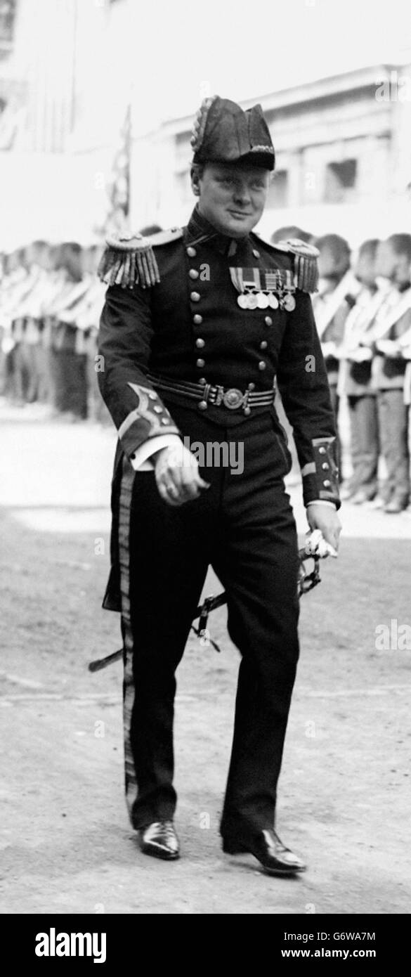 First Lord of the Admiralty Winston Churchill, in uniform, leaving the Guildhall during the visit of the French President. (The uniform is that of the Elder Brother of Trinity House). Stock Photo