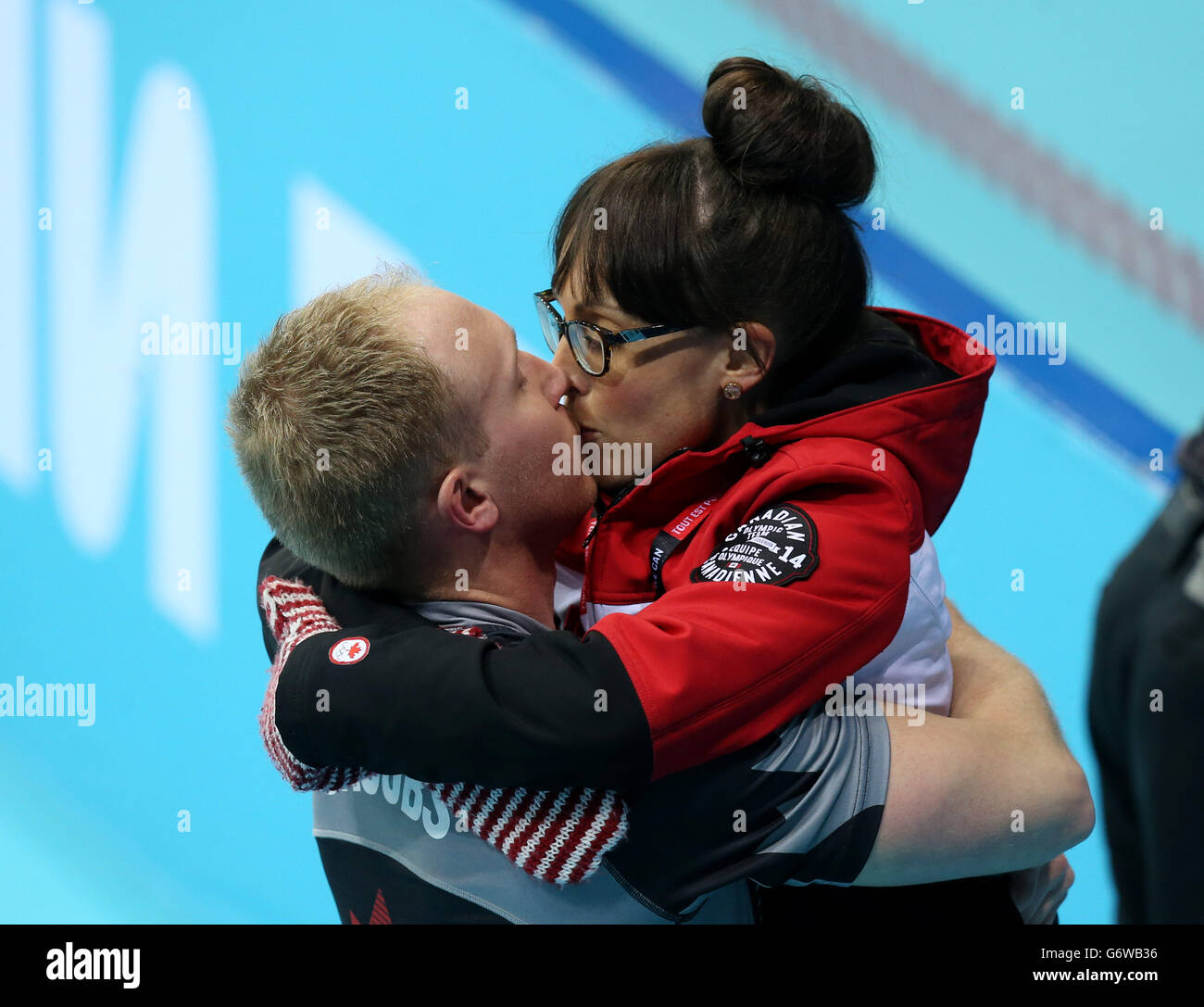 Canadas skip brad jacobs kisses his wife shawna hires stock