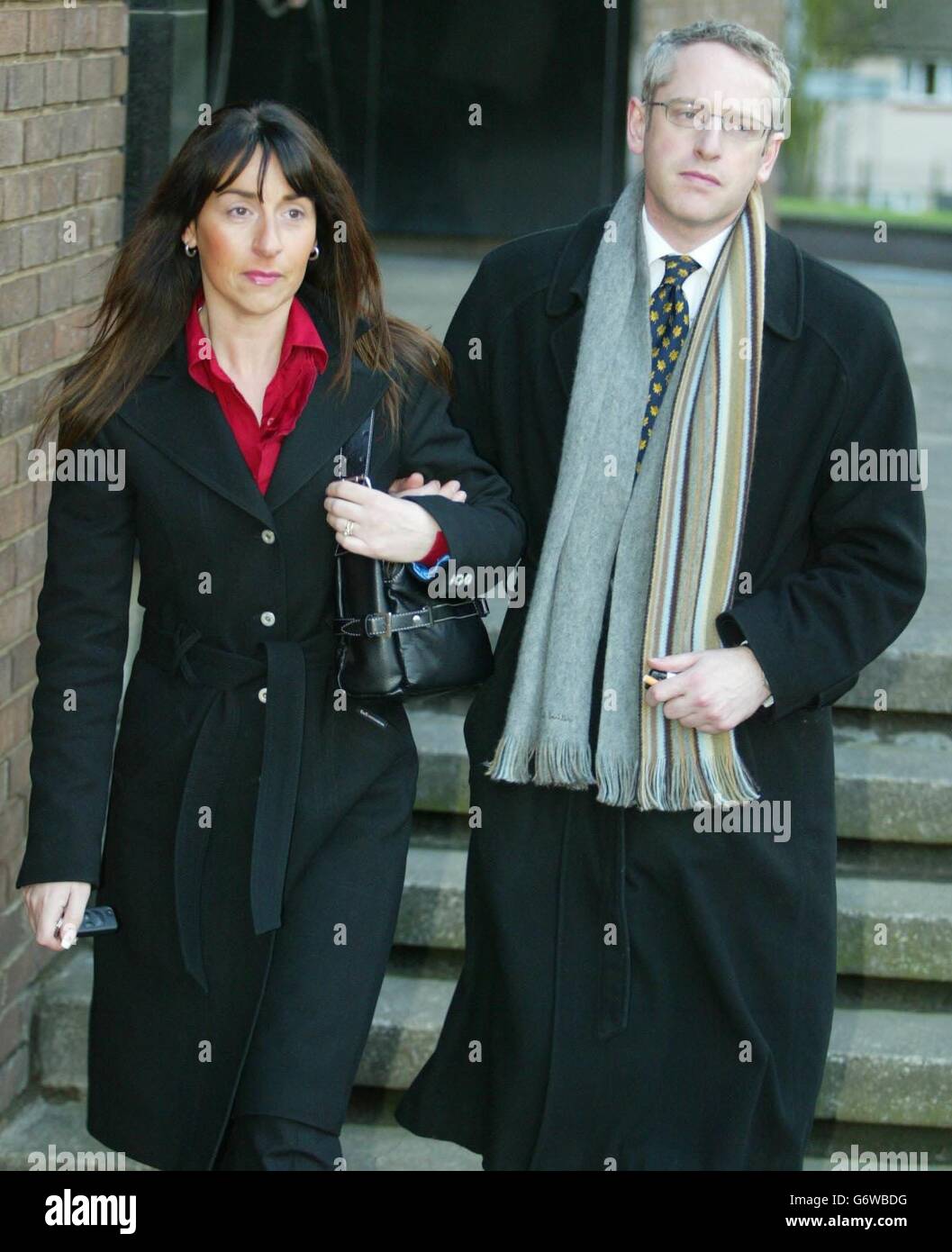 John Walker's son Adrian Walker and his daughter Jane Robson leave Ipswich Crown Court, Suffolk. Their father John Walker is on trial for killing his wife by shooting her at the breakfast table at their home in Grt Bealings, Suffolk. Stock Photo