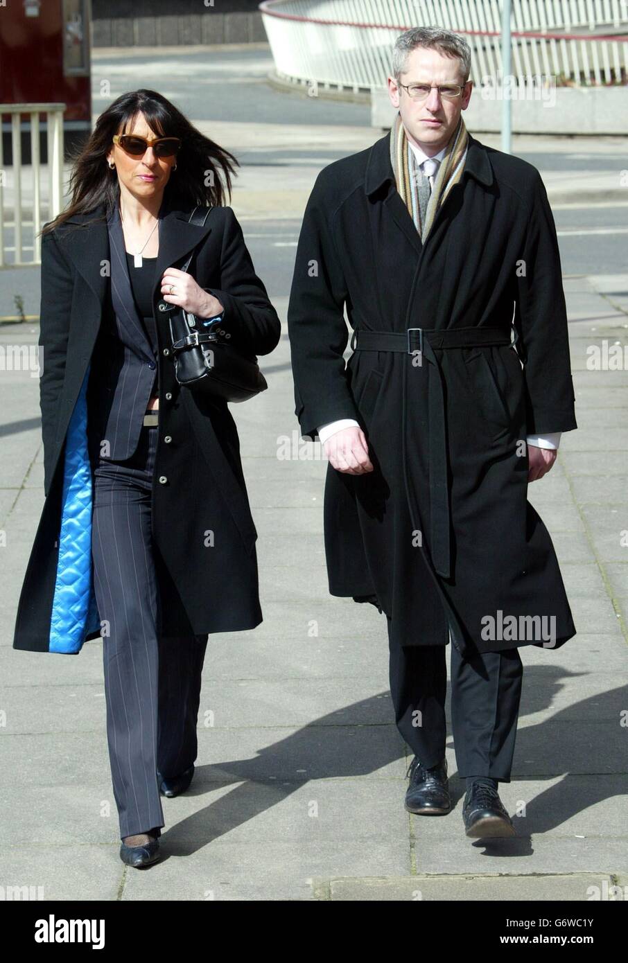 John Walker's son, Adrian Walker, and his daughter, Jane Robson, arrive at Ipswich Crown Court, Suffolk. John Walker, a retired agricultural scientist, told a jury yesterday that he shot his wife over breakfast after she told him that she was going to 'take everything off him' because of his affair with a woman he met at a dancing class. Stock Photo