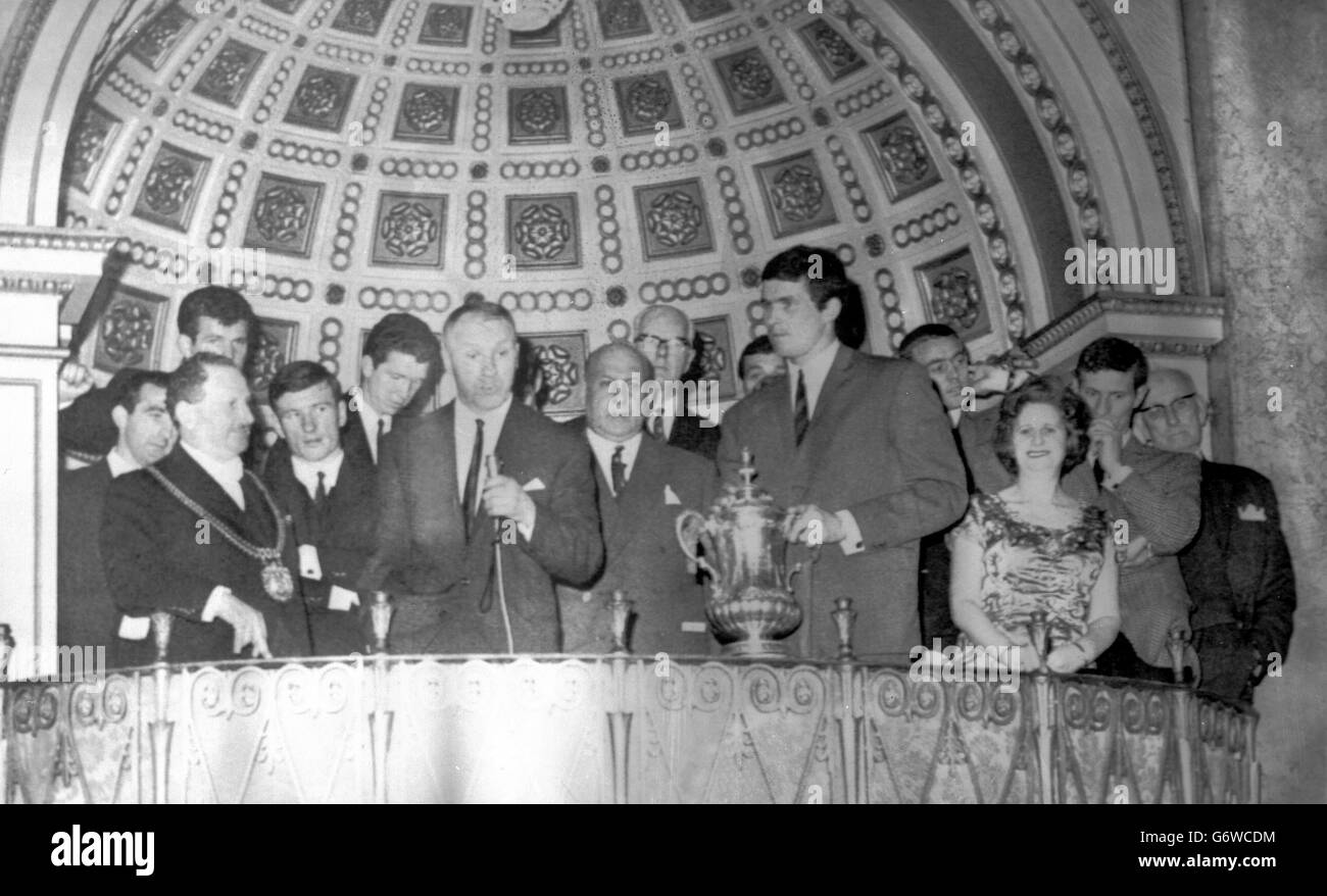 Liverppol manager Bill Shankly addressing the guests who welcomed the Liverpool team at a civic reception at the Town Hall on their return to Liverpool after beating Leeds United in the Cup Final at Wembley. On left is the Lord mayor of Liverpool, Alderman Louis Caplan. Others in the photo are players Byrne, Stevenson, Smith, Lawler, Liverpool Chairman S. Reakes, Callaghan, Yeats (holding FA Cup, captain Ian St John, the Lady Mayoress fanny Bodker, Stevenson and T.V Williams, Preseident of Liverpool FC> Stock Photo