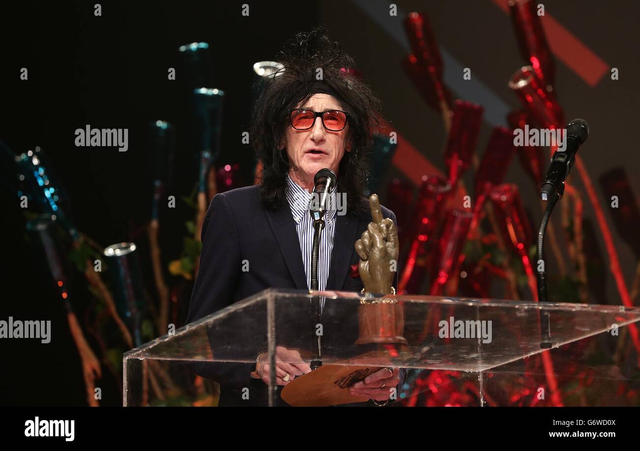 John cooper clarke on stage during the 2014 nme awards hi-res stock