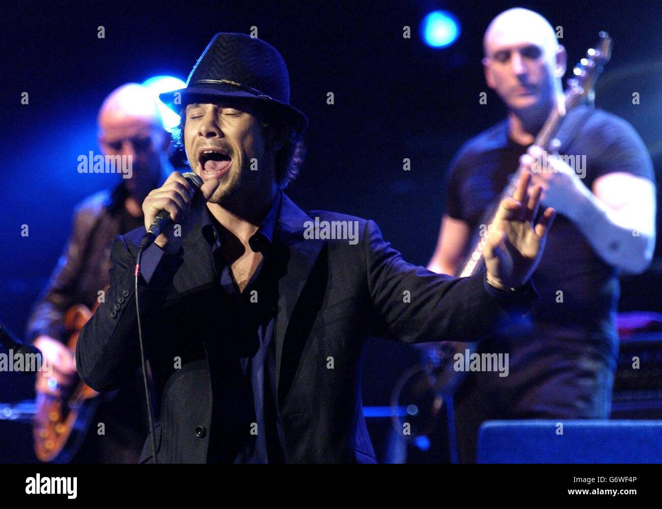 Singer Jay Kay from Jamiroquai performs live on stage during An Evening With Jools Holland, as part of the 'The Who And Friends' fundraising week of gigs, in aid of the Teenage Cancer Trust, at the Royal Albert Hall in London. Stock Photo