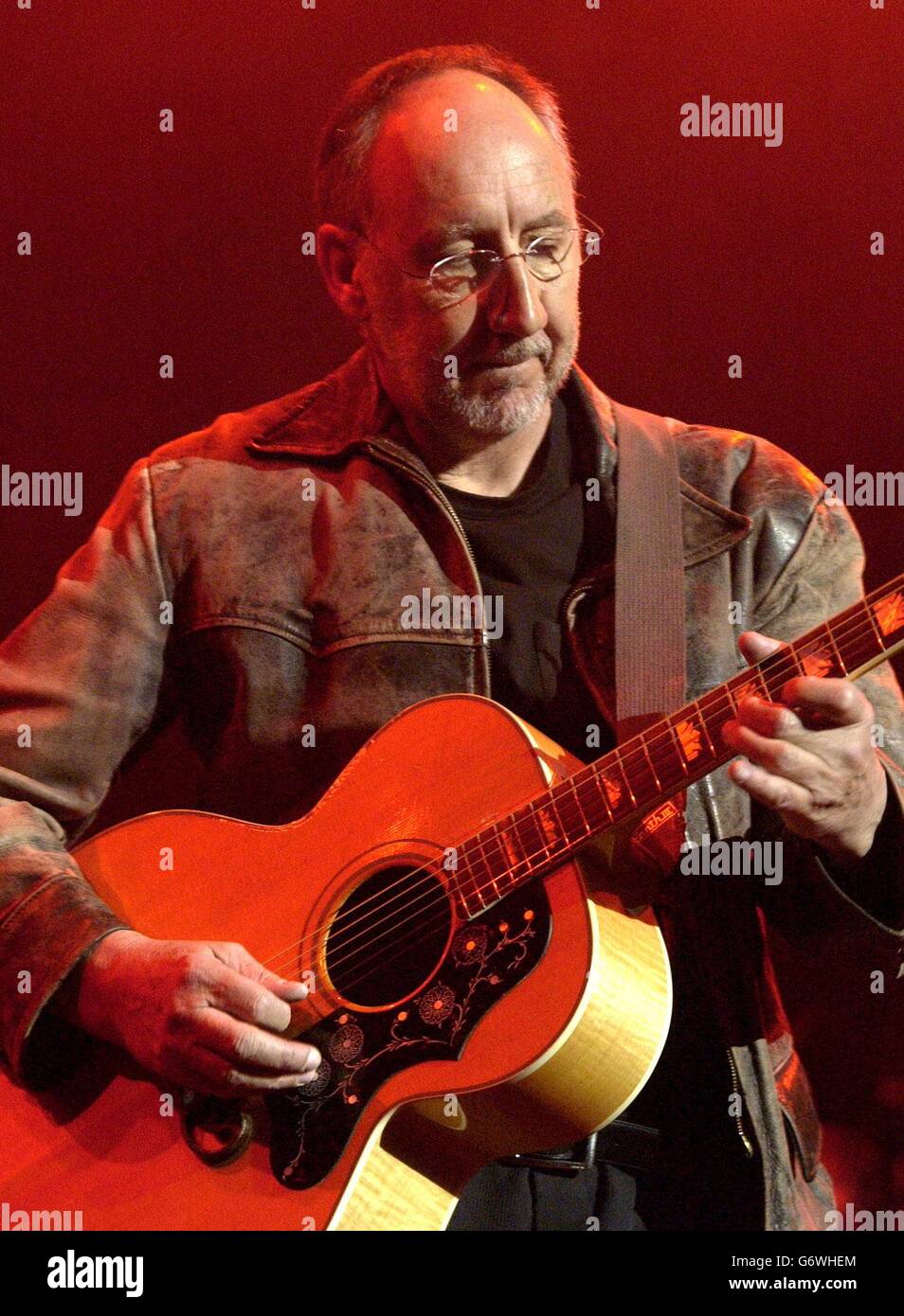 Pete Townshend performs on the stage during Ronnie Lane Tribute concert at The Royal Albert Hall in central London. Stock Photo