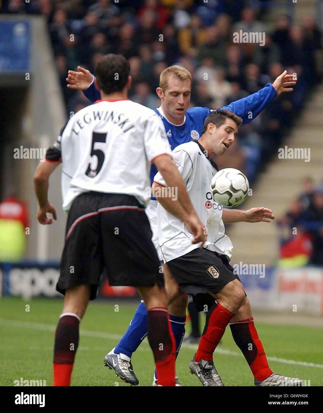 Fulham's Carlos Bocanegra keeps off Leicester City's James Scowcroft during the Barclaycard Premiership match at the Walker's Stadium, Leicester. Stock Photo