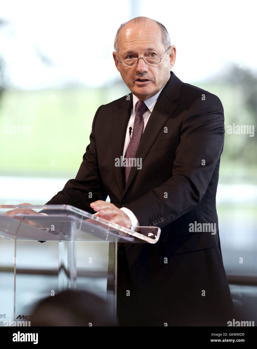 Ron Dennis, CEO of the McLaren Group, speaking, during Education Secretary Michael Gove's visit to the McLaren Technology Centre in Woking. Stock Photo