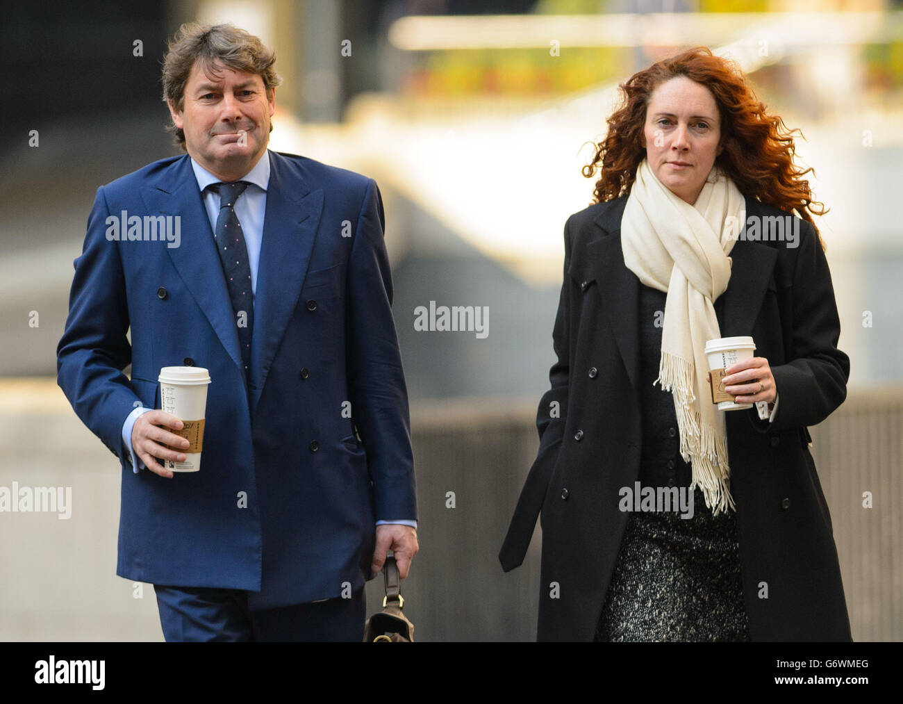 Former News International chief executive Rebekah Brooks and her husband Charlie Brooks arrive at the Old Bailey in London, as the phone hacking trial continues. Stock Photo