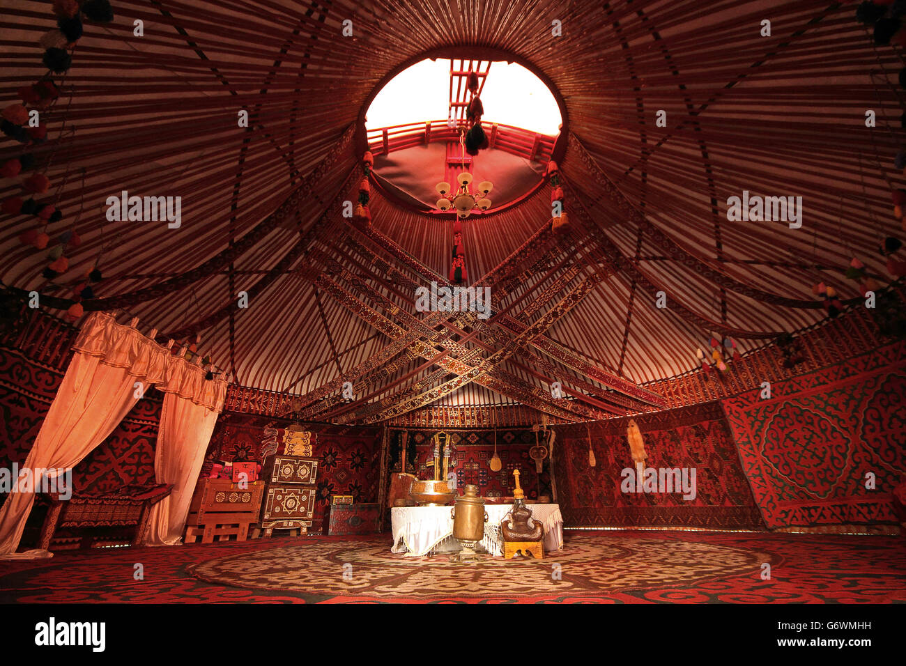 Interior of a nomadic yurt in the city of Turkestan, in Kazakhstan. Stock Photo
