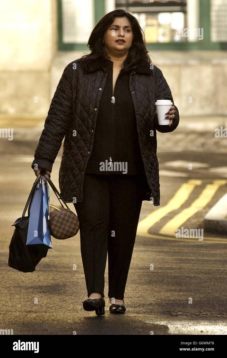 Joyti De-Laurey, who is accused of fleecing a 4.5 million fortune from her bosses, arrives at Southwark Crown Court in Central London as the jury continues to consider its verdict. The six-man, six-woman panel has heard that city secretary De-Laurey, 35, used her allegedly ill-gotten gains for 'astonishing' spending sprees on jewellery, designer clothes, fast cars and properties in this country and abroad. Stock Photo