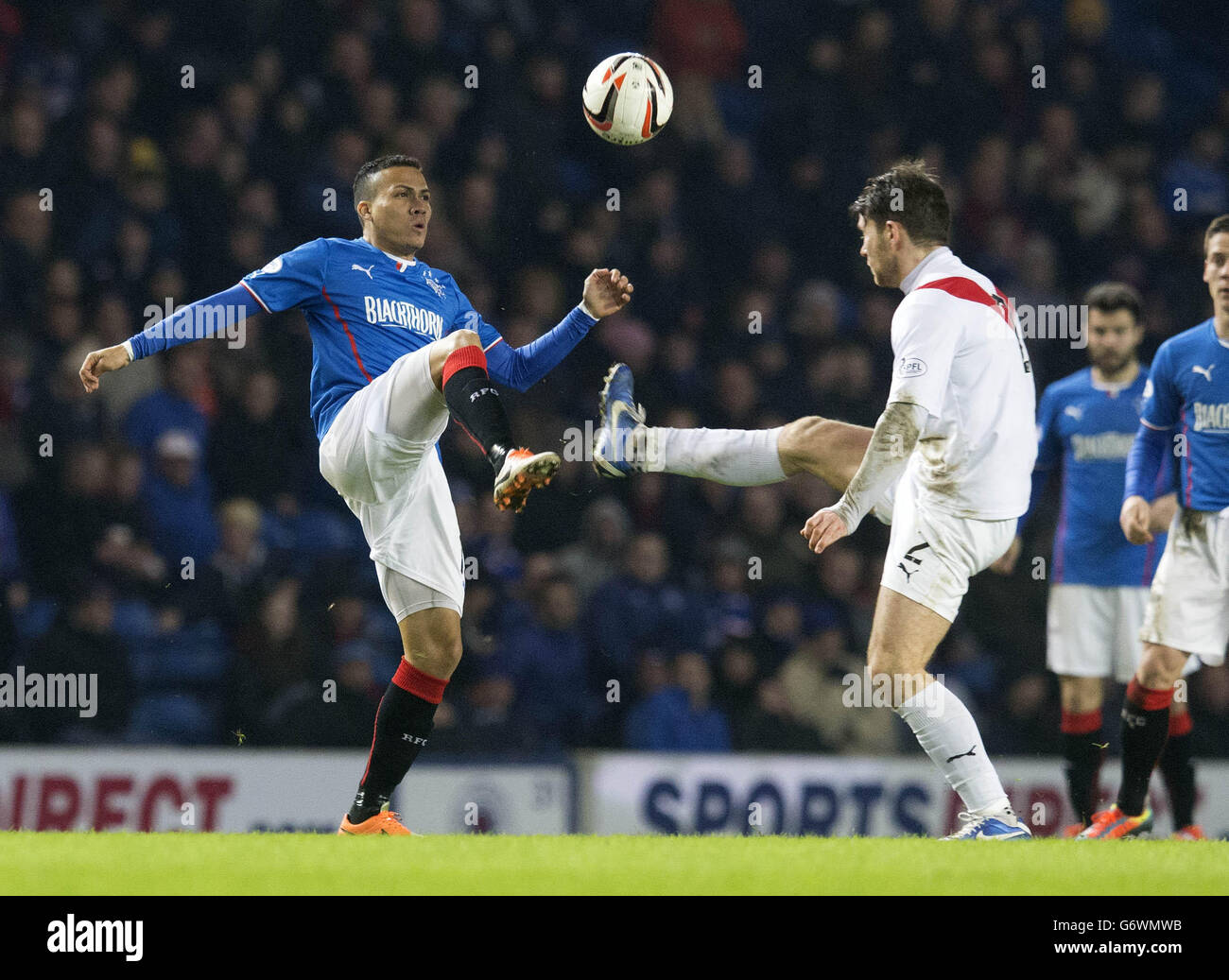 Rangers Arnold Peralta (left) in action with Aidrie's Liam Watt (right) during the Scottish League One match at Ibrox, Glasgow. Stock Photo
