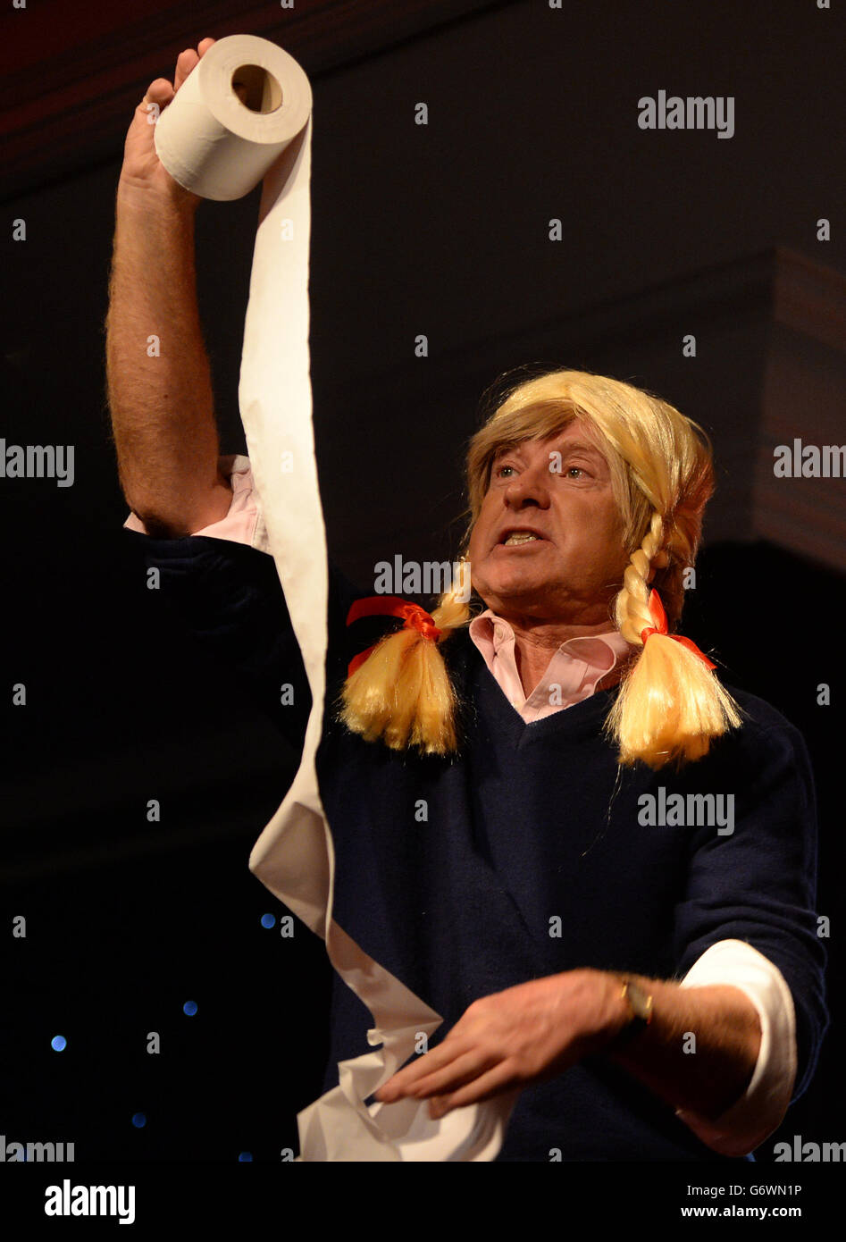Michael Fabricant performs during the Macmillan Cancer Support annual Parliamentary Palace of Varieties fundraising evening at the Intercontinental London Park Lane, London. Stock Photo