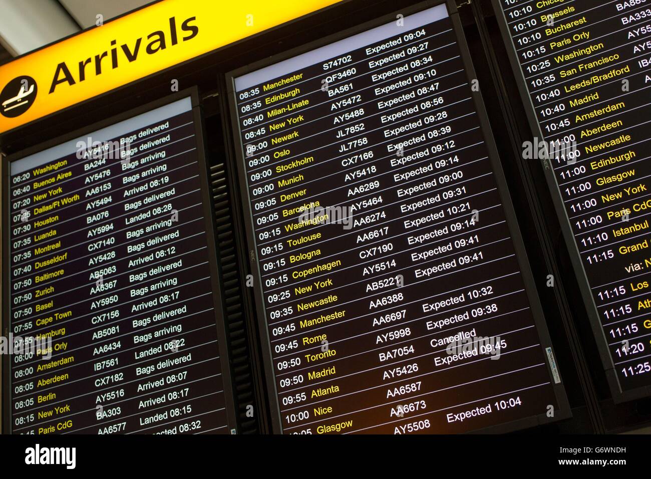 A arrivals board at Terminal 5 of Heathrow Airport, as number of flights across the UK have been cancelled because of early-morning fog. Stock Photo