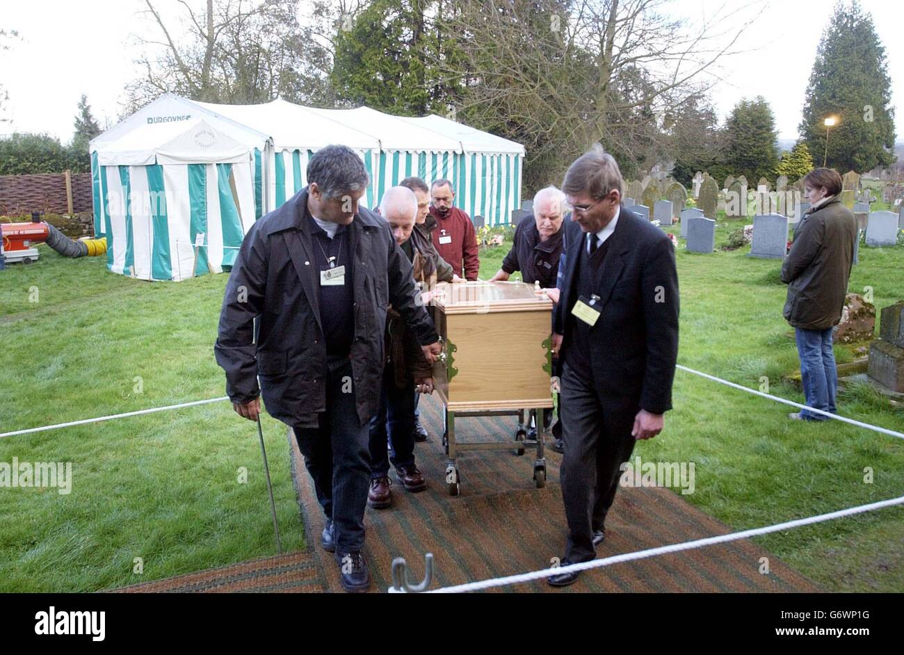 Graveyard crime exhuming exhume drugs police exhumed coffin hi-res ...