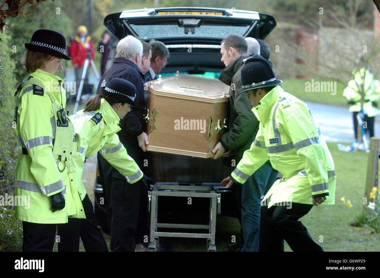 Rachel Whitear's coffin is led to a hearse, after it was exhumed at the Church of St Peter in Withington, near Hereford. It was originally thought that Miss Whitear died from a drugs overdose at her bedsit in Exmouth, Devon, but no post-mortem examination was carried out prior to an inquest which recorded an open verdict. Stock Photo