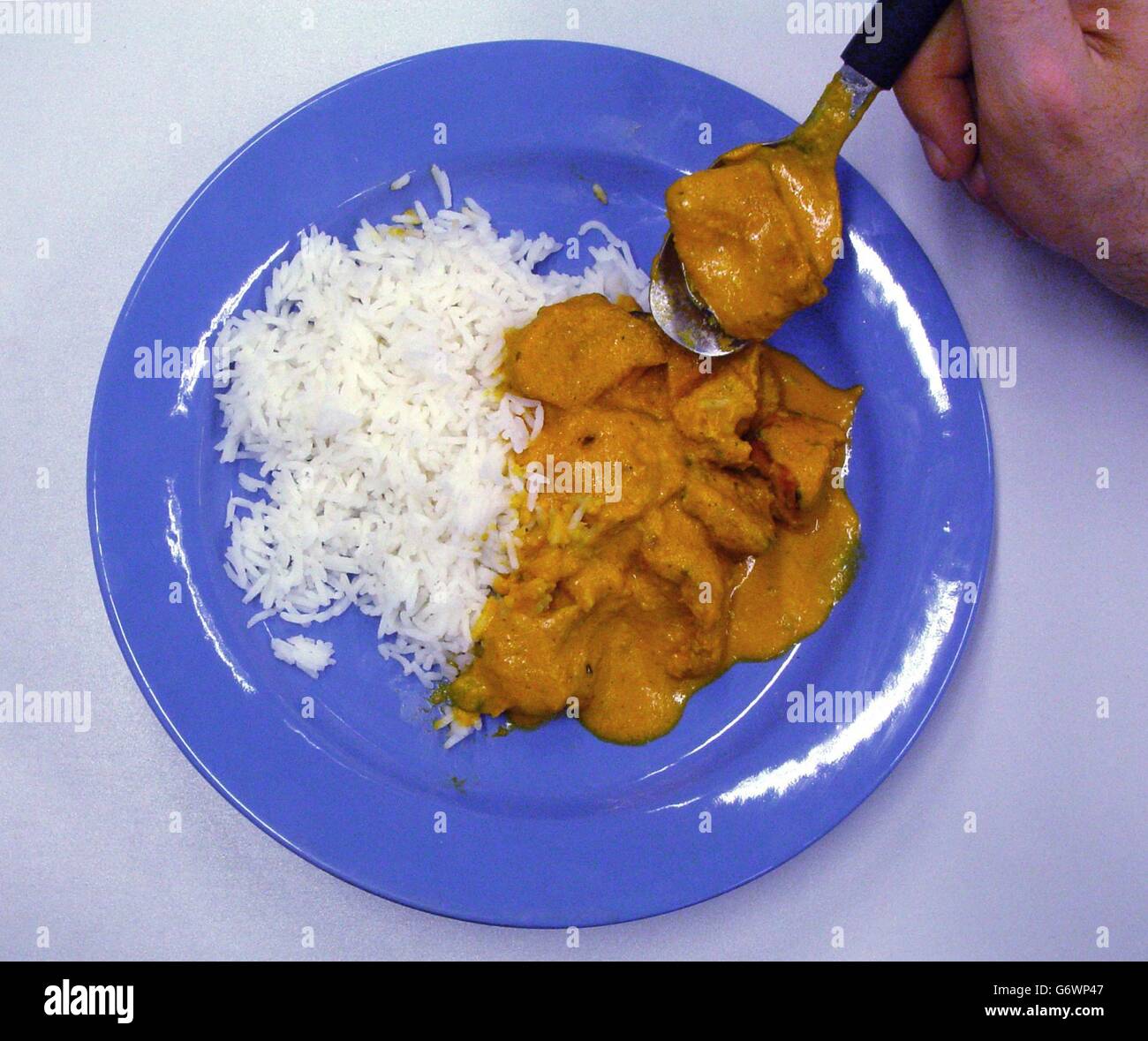 A dish of chicken tikka massala. Food colourings linked to hyperactivity, asthma, and even cancer, have been detected in chicken tikka massala, one of the UK's favourite dishes, consumer chiefs warned. Random tests ordered by Trading Standards officers in Surrey suggest 57% of Indian restaurants in the county use 'illegal and potentially dangerous' levels of dyes to give the sauce its distinctive orange-red hue. The tests focused on the use of three specific chemicals - Tartrazine (E102), Sunset Yellow (E110) and Ponceau 4R (E124). Stock Photo