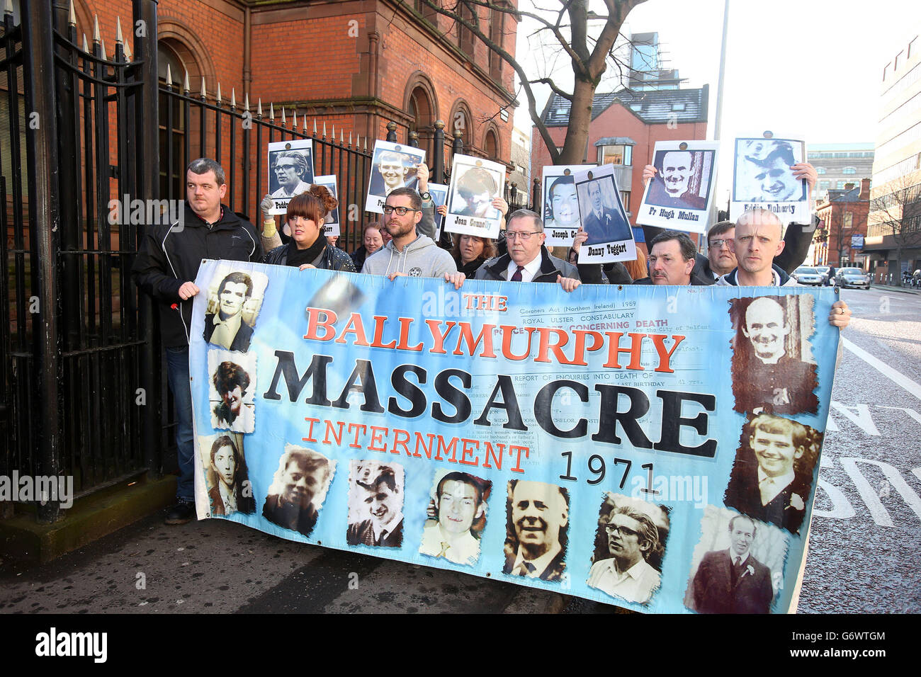 Protesters outside Belfast Coroner's Court at the start of a new inquest into the deaths of 10 people shot dead by British soldiers in west Belfast in 1971. Stock Photo