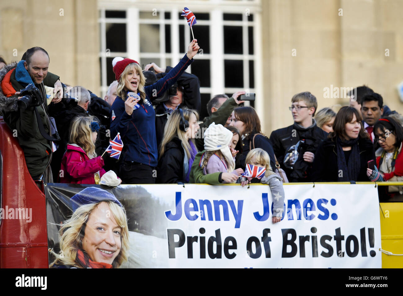 Olympic bronze medal winner Jenny Jones' open-top bus tour of Bristol arrives the city hall, following her third place finish in the snowboard slopestyle event at the Winter Olympics in Sochi, Russia. Stock Photo