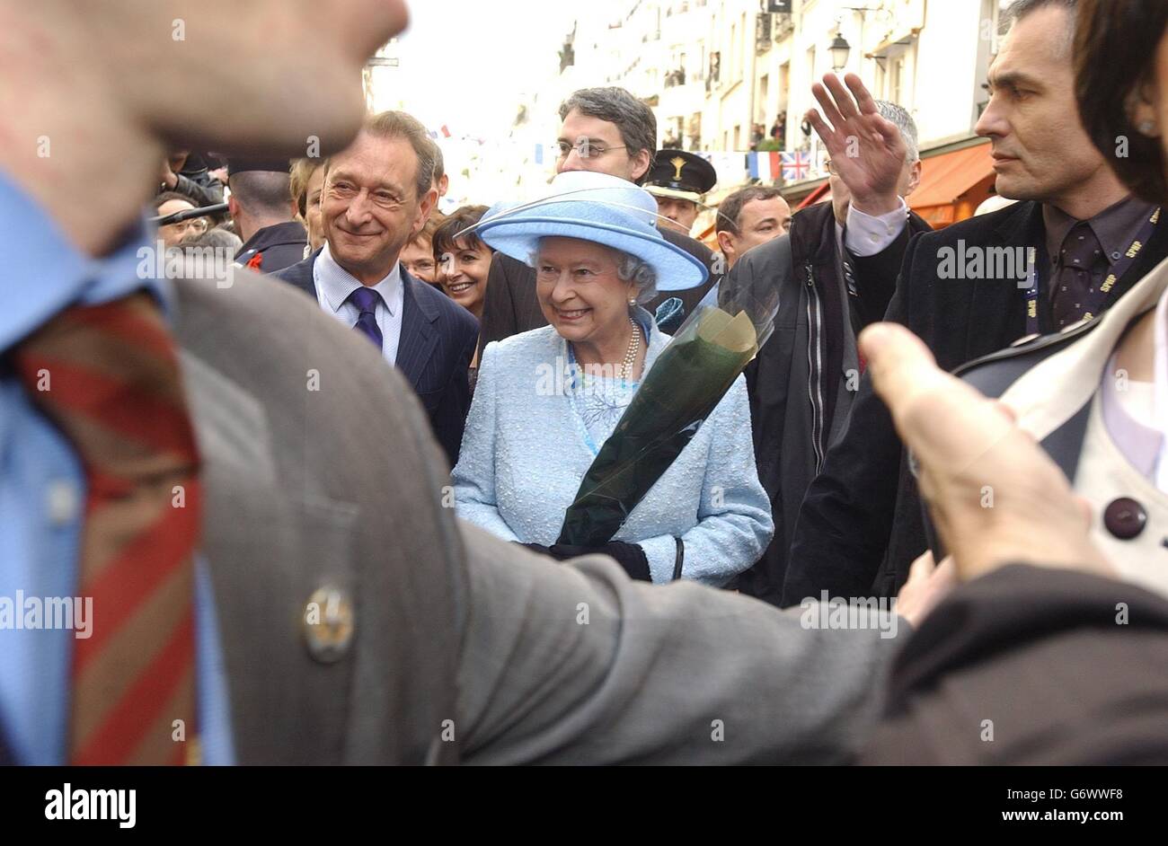 Britain's Queen Elizabeth II on a walkabout outside Cerise Community Centre in Paris, during her official three-day state visit to France. The monarch's three-day stay in the country marks 100 years of the Anglo-French Entente Cordiale agreement. Stock Photo