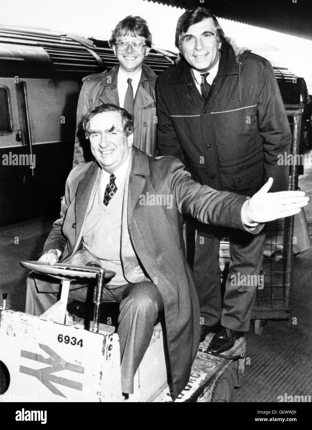 Labour MP Denis Healey (in the driving seat) taking a left turn at Bristol Temple Meads Station. Along for the ride are Labour prospective parliamentary candidates Roger Berry (l) and Terry Walker. Stock Photo