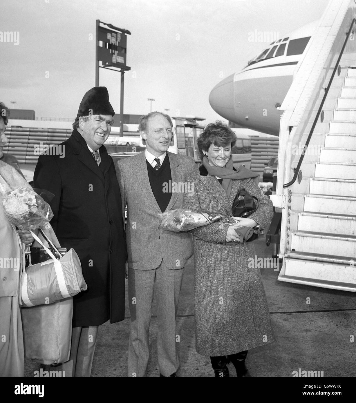 Labour leader Neil Kinnock (centre), with his wife Glenys and Shadow Foreign Secretary Denis Healey, at London Heathrow Airport before flying to the Soviet Union. Stock Photo