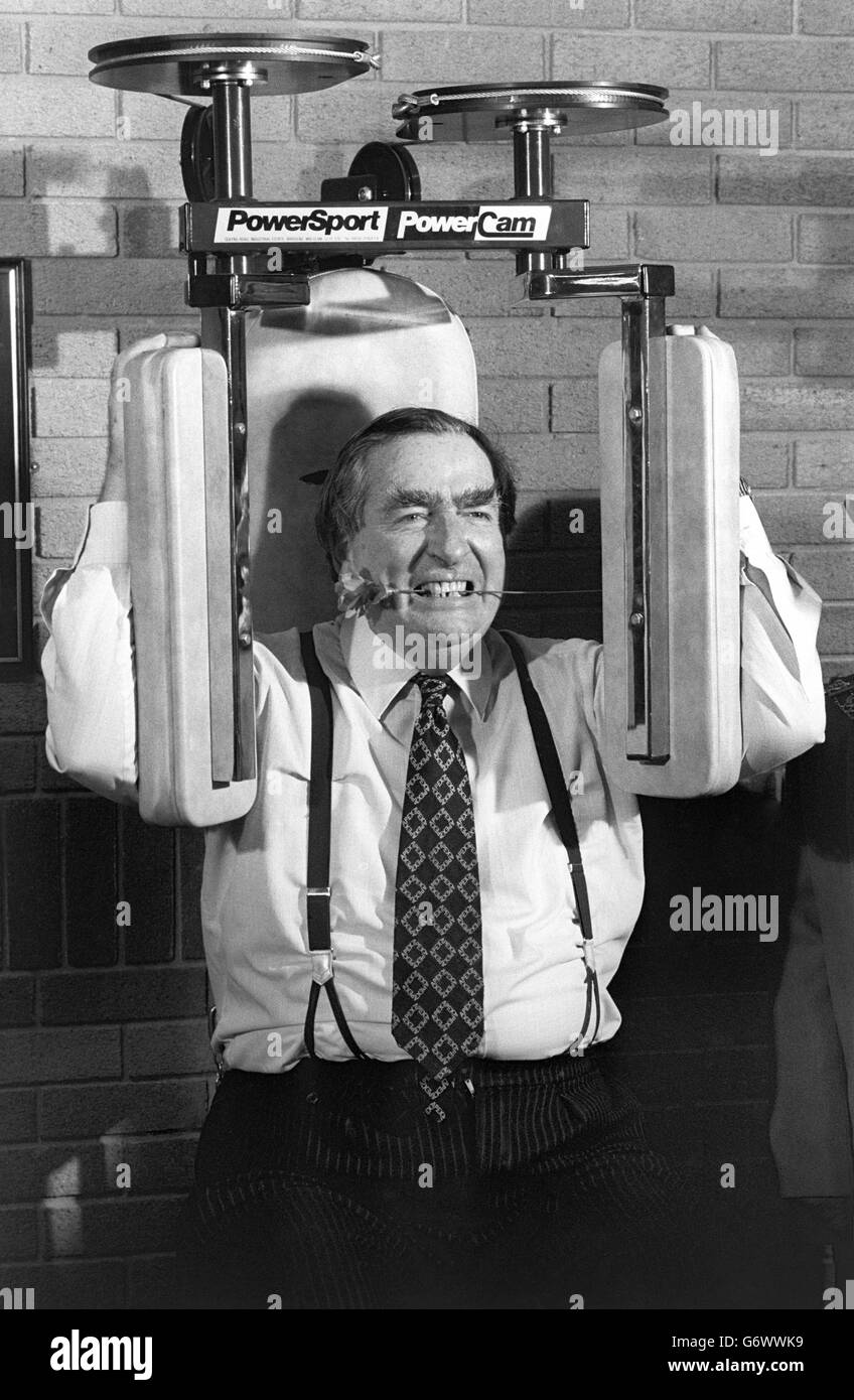 Denis Healey, clutching a symbolic Labour rose, tries out a triceps improver at the Abbey Sports Centre in Barking, east London. The Shadow Foreign Secretary was on a tour of educational establishments, his contribution to Labour's election campaign, during which he launched an attack on Prime Minister Margaret Thatcher and the 'raving right' of the Tory party. Stock Photo