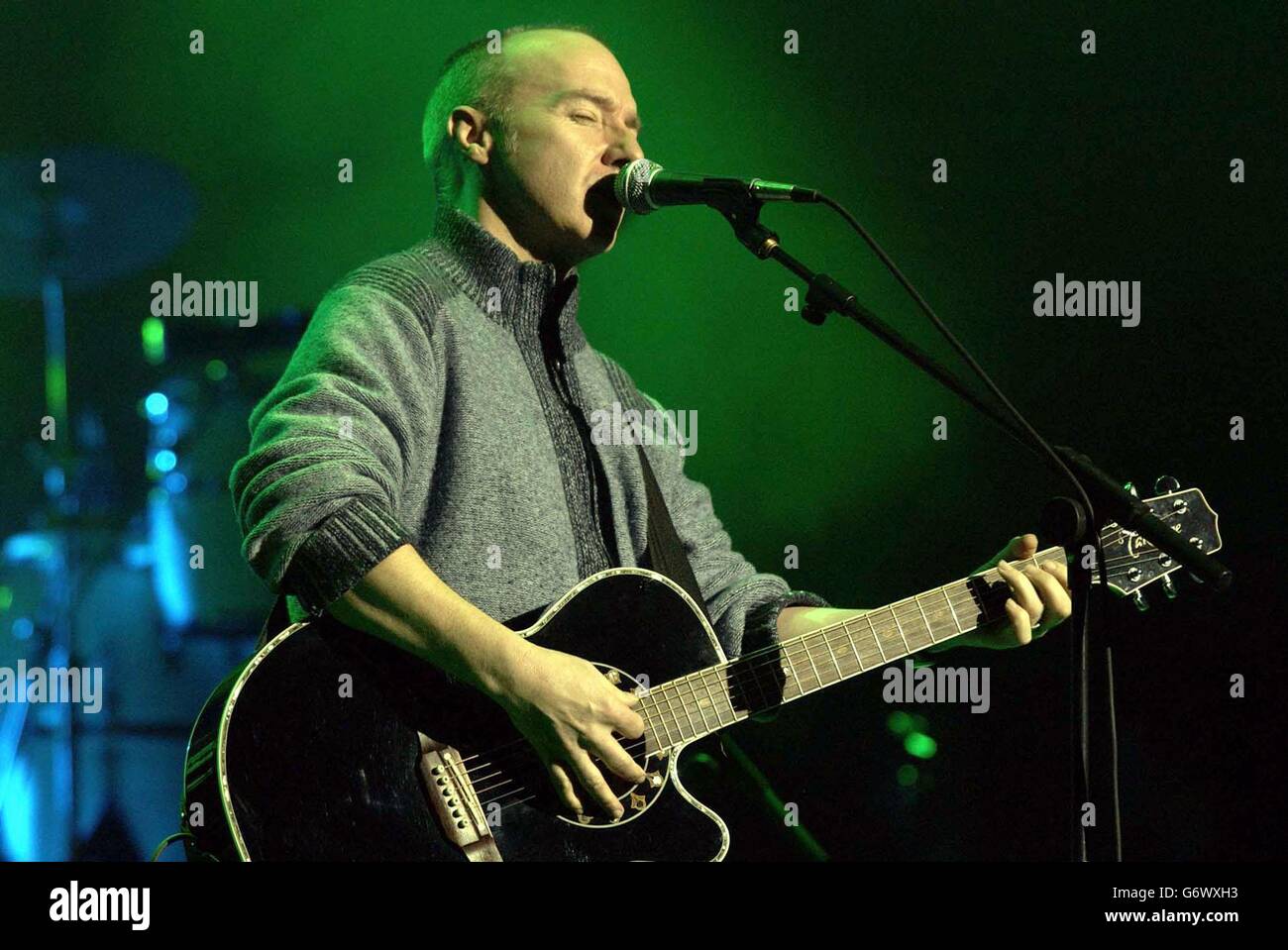 Midge Ure performing onstage during the Ronnie Lane tribute concert, held at the Royal Albert Hall, central London. Founder member of Small Faces, Ronnie Lane, died in 1997, aged 51, after a protracted battle with muscular sclerosis. Stock Photo