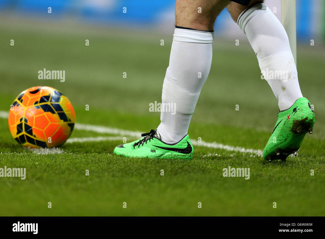 England's Wayne Rooney wears his initials on his boots Stock Photo - Alamy