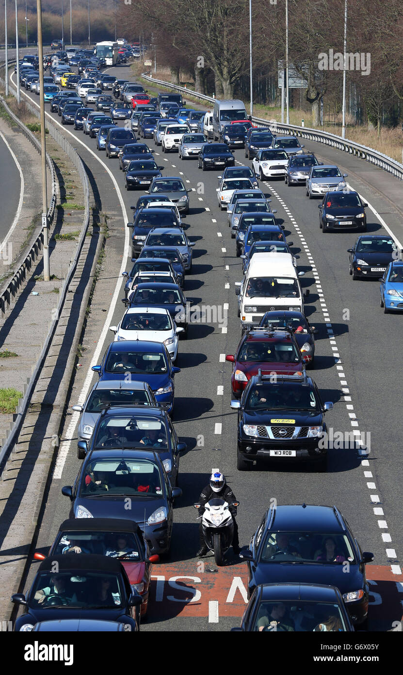 Cars queue on the A23 near Brighton, East Sussex, as visitors to the ...