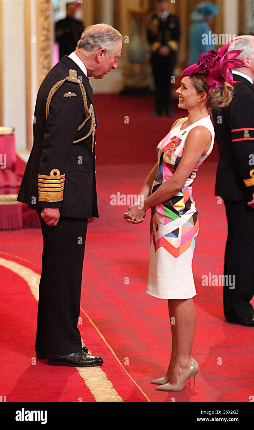 Singer Katherine Jenkins is made an OBE (Officer of the Order of the British Empire) by the Prince of Wales during an Investiture ceremony at Buckingham Palace in central London. Stock Photo