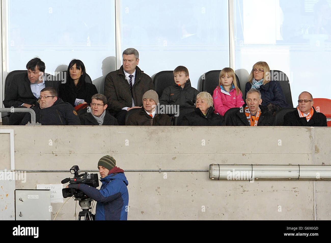 Blackpool owner Karl Oyston (back row, left) along with Manchester City executive staff member Brian Marwood (front row, second left) look on from the VIP area Stock Photo