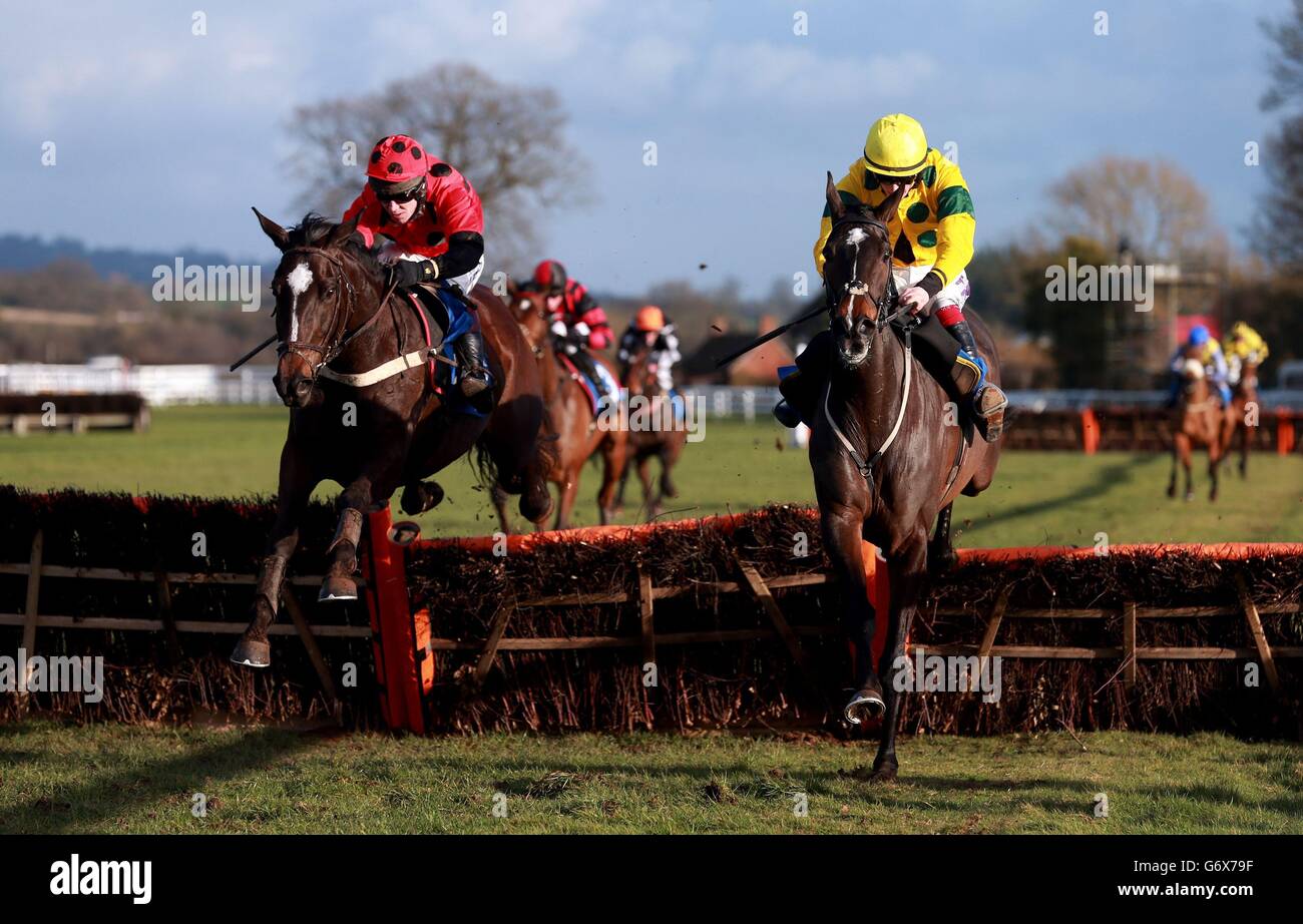 Spencer Lea ridden by Richard Johnson (left) and Garrahalish ridden Charlie Poste in the &pound;25 Free Bet At corbettsports.com 'National Hunt' Novices Handicap Hurdle at Ludlow Racecourse, Shropshire. Stock Photo