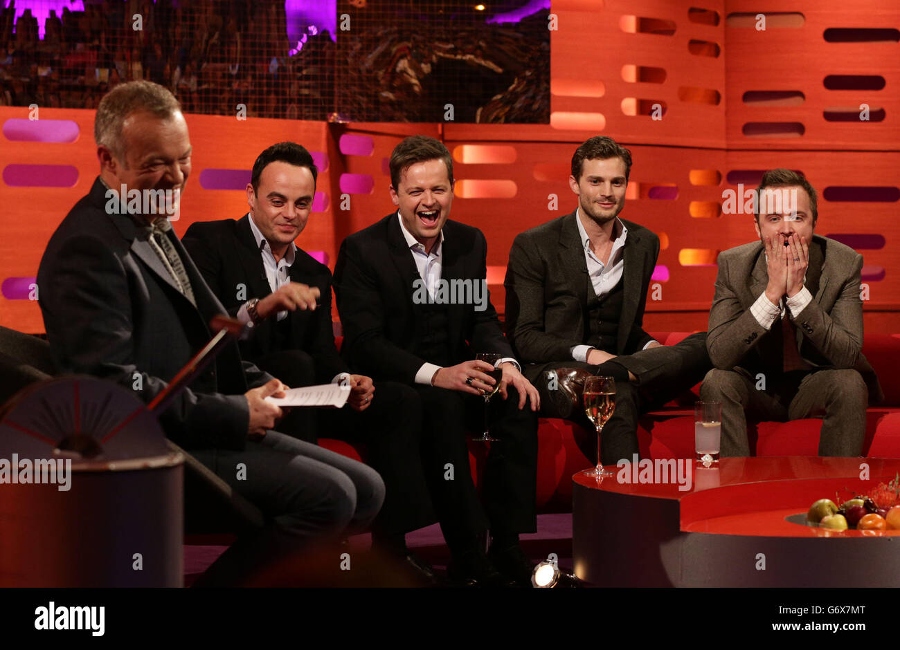 Host Graham Norton (left) with guests (left to right) Anthony McPartlin, Declan Donnelly, Jamie Dornan and Aaron Paul, during the filming of the Graham Norton Show at the London Studios, south London, to be aired on BBC One on Friday evening. Stock Photo