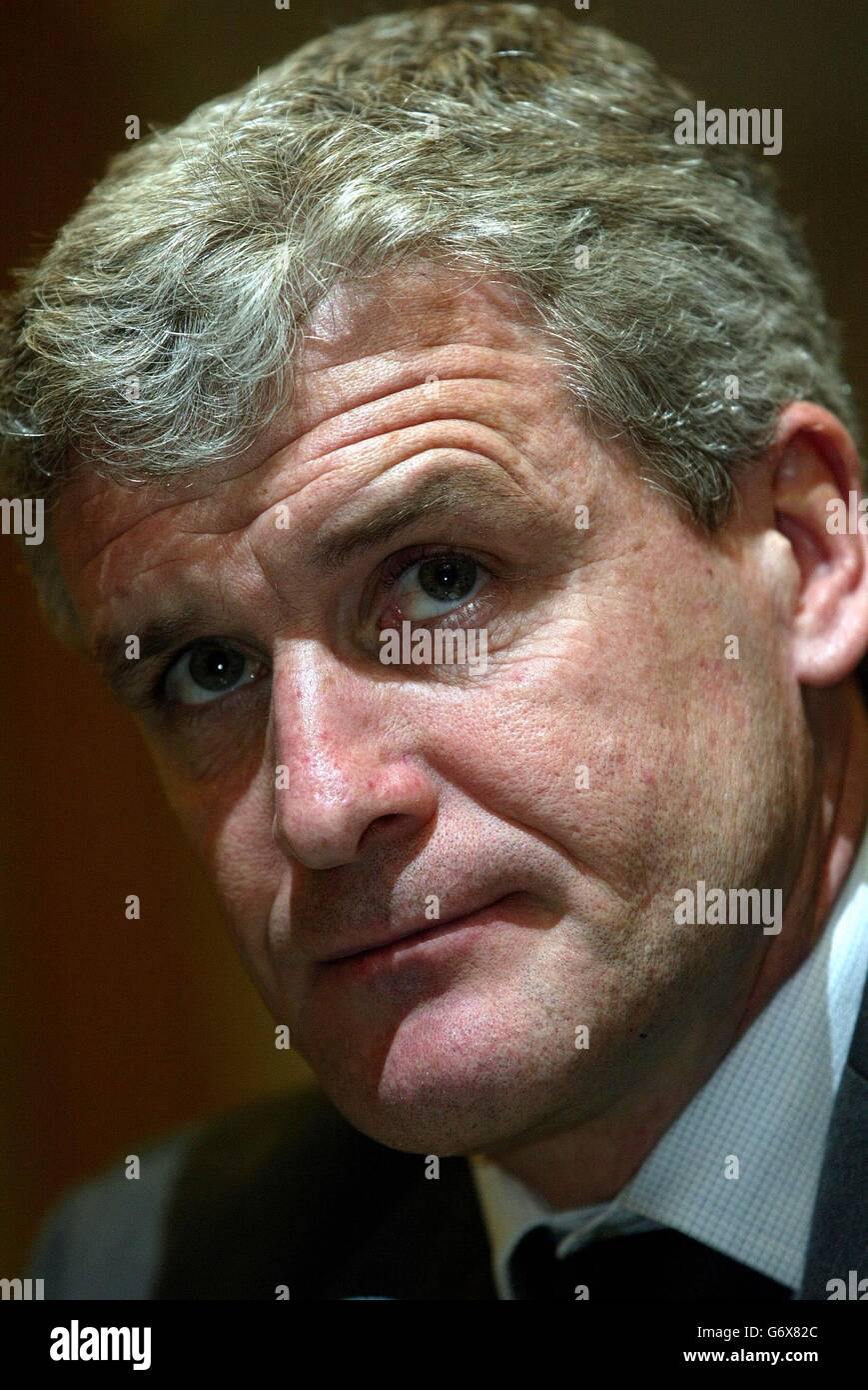 Wales national soccer coach Mark Hughes gives an interview to Hungarian TV, during a press confrence at the team hotel in Budapest ahead of Wales friendly international against Hungary tomorrow night. 12/06/04: Mark Hughes who has been awarded an OBE (Officer of the British Empire), in the Queen's Birthday Honours List. Stock Photo