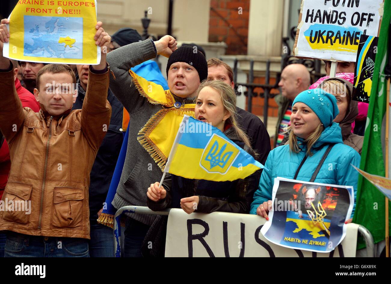 British-based Ukrainians gather outside the Russian Embassy in London to protest against the build-up of troops in the Crimea region. Stock Photo