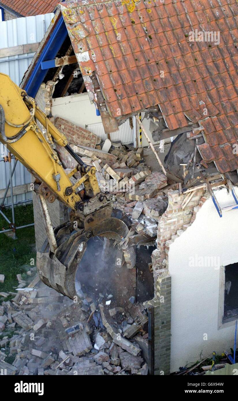Workmen demolish the home of former Soham Village College caretaker and convicted child killer