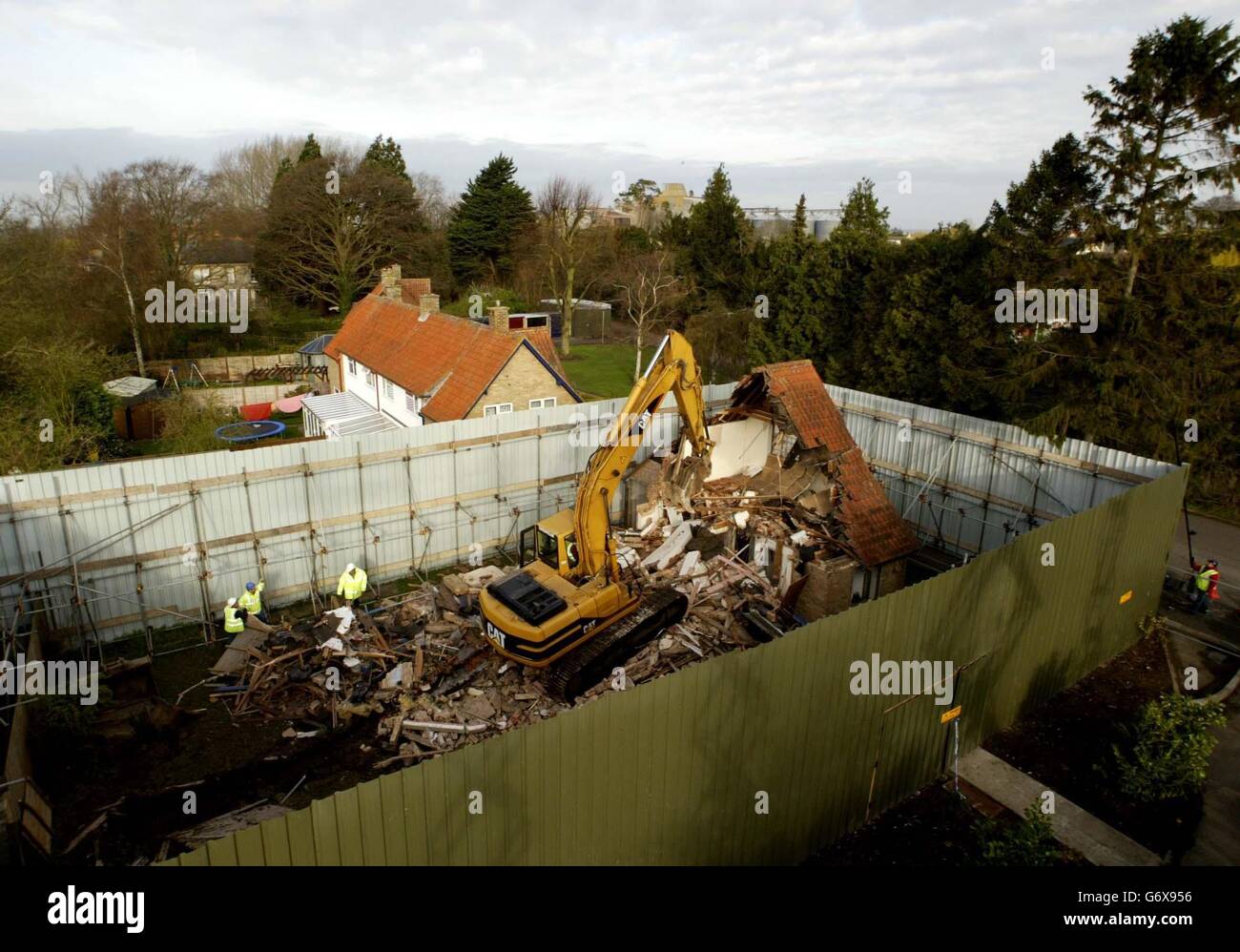 Workmen demolish the home of former Soham Village College caretaker and convicted child killer