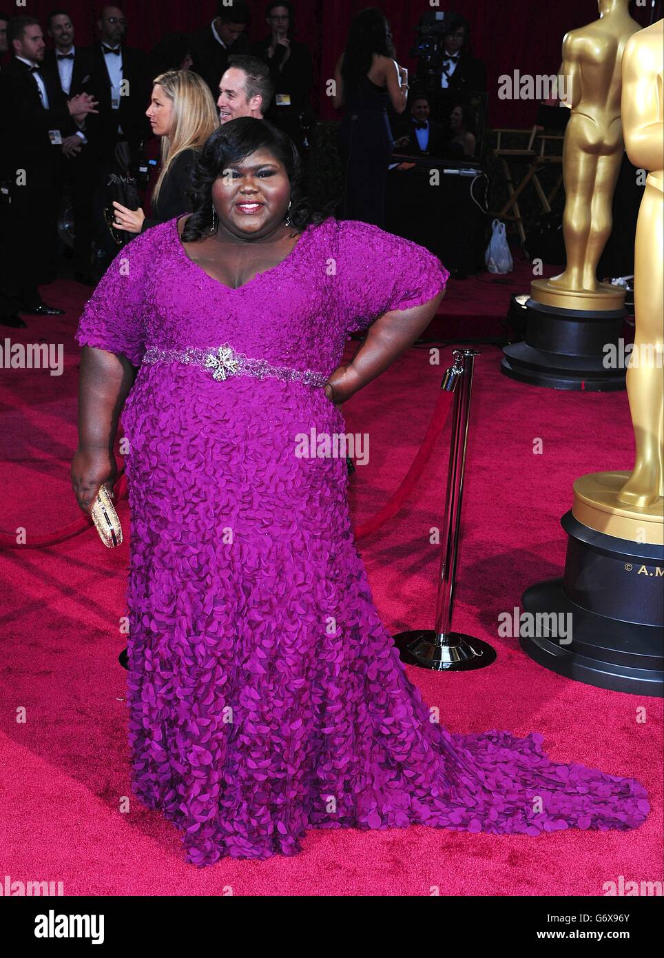 Oscars redcarpet red carpet pink floor dress clutch bag cleavage hires