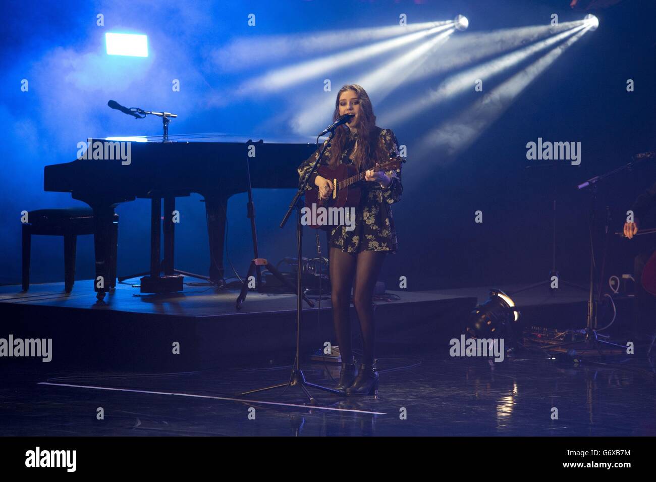 Birdy singing on stage at the inaugural WE Day UK at Wembley Arena in London. Stock Photo