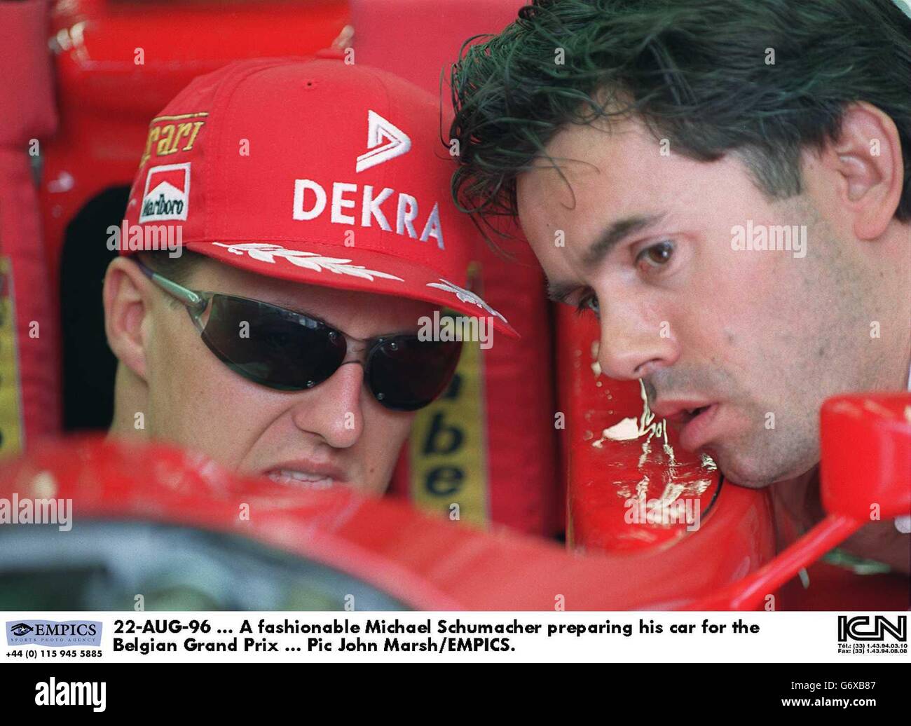 22-AUG-96, A fashionable Michael Schumacher preparing his car for the