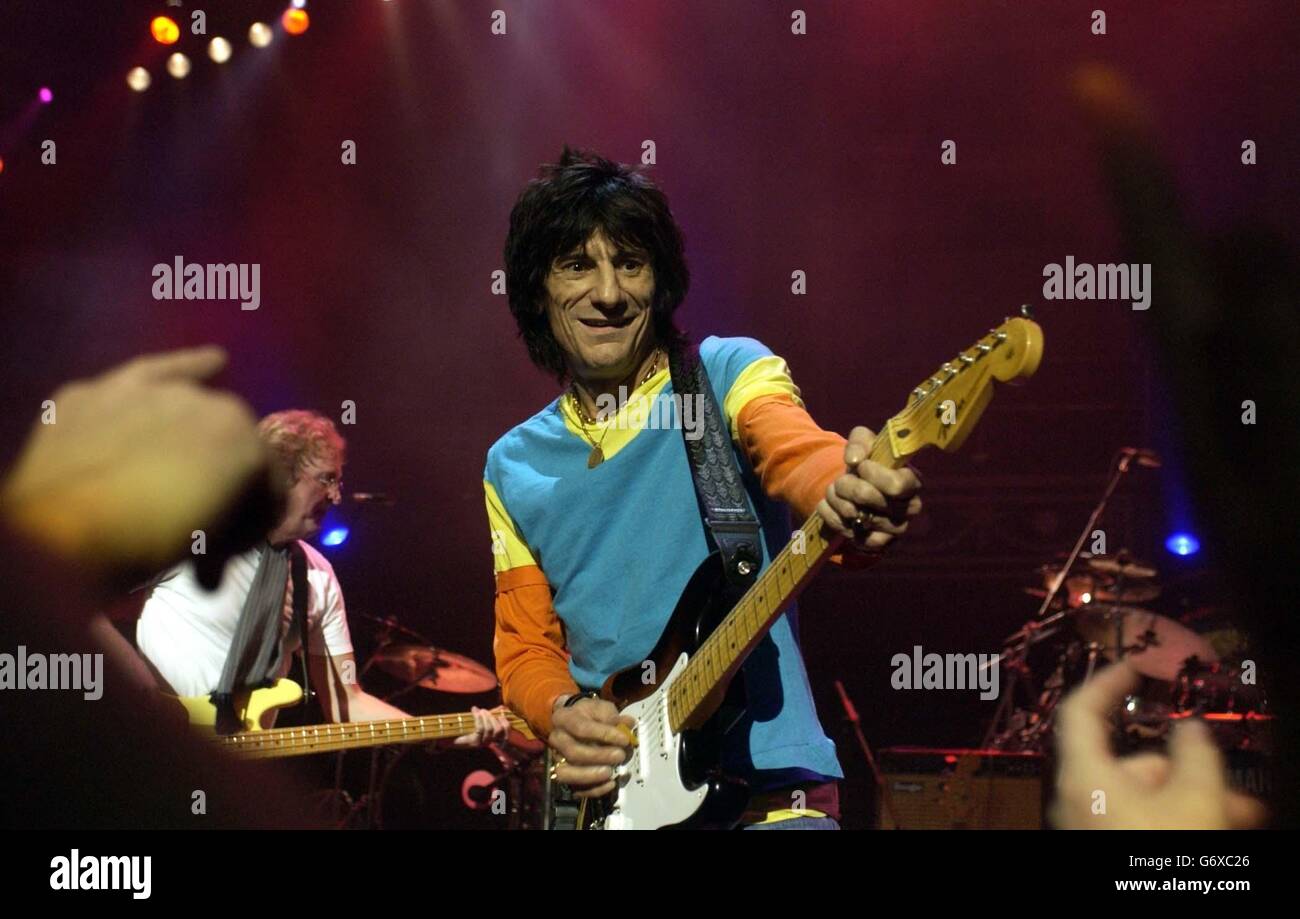 Ronnie Wood performs on the stage during Ronnie Lane Tribute concert at The Royal Albert Hall in central London. Stock Photo