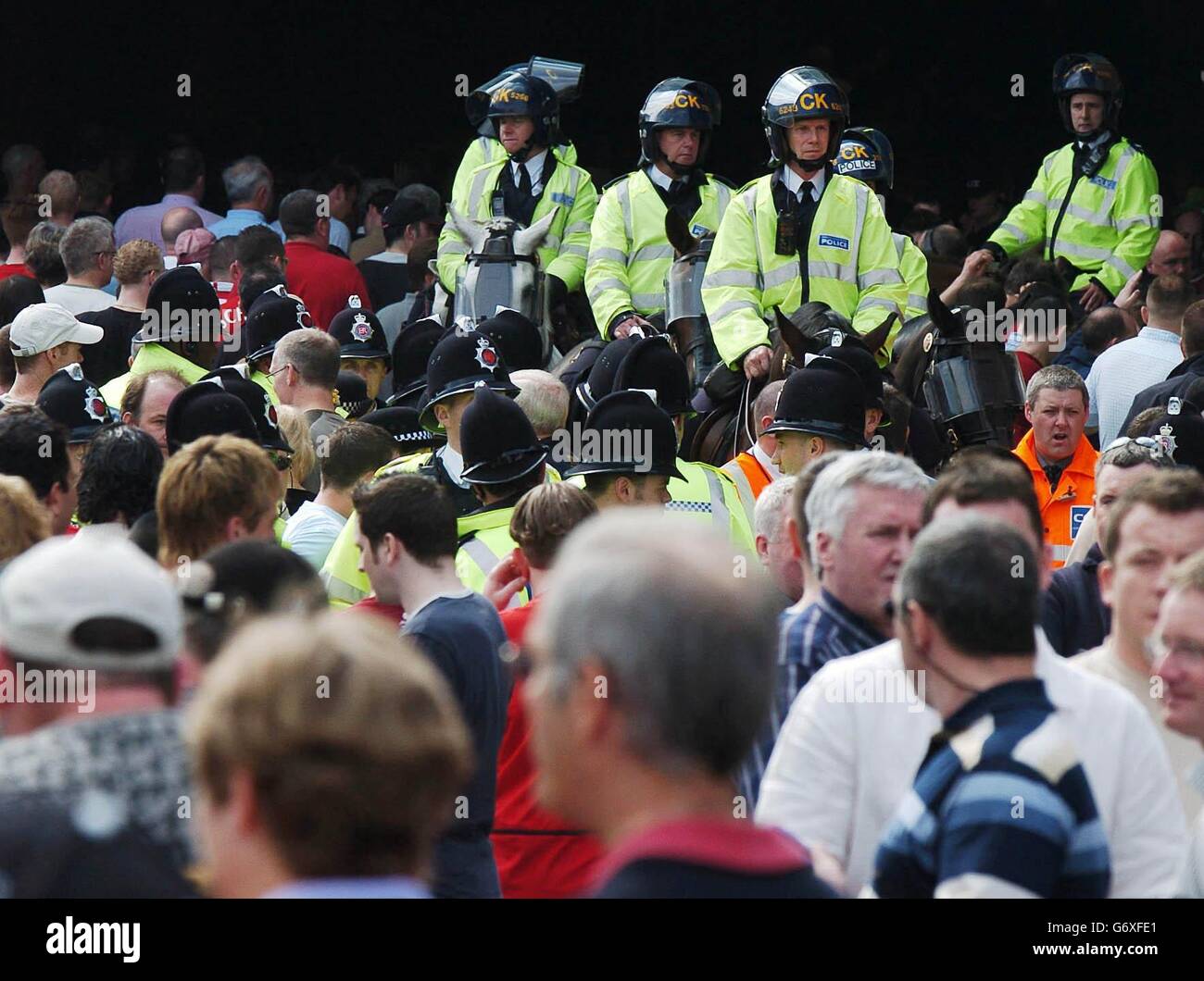 Security is tight at Old Trafford, for the high-profile clash between Manchester United and Liverpool, in the wake of a series of anti-terror raids. Stock Photo