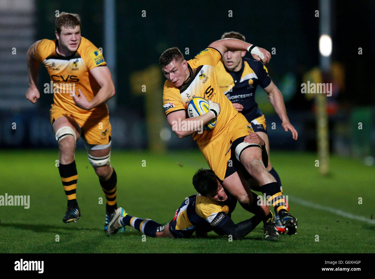 Wasps Tom Lindsay is tackled by Worcester's Jonny Arr during the Aviva Premiership match at Sixways Stadium, Worcester. Stock Photo