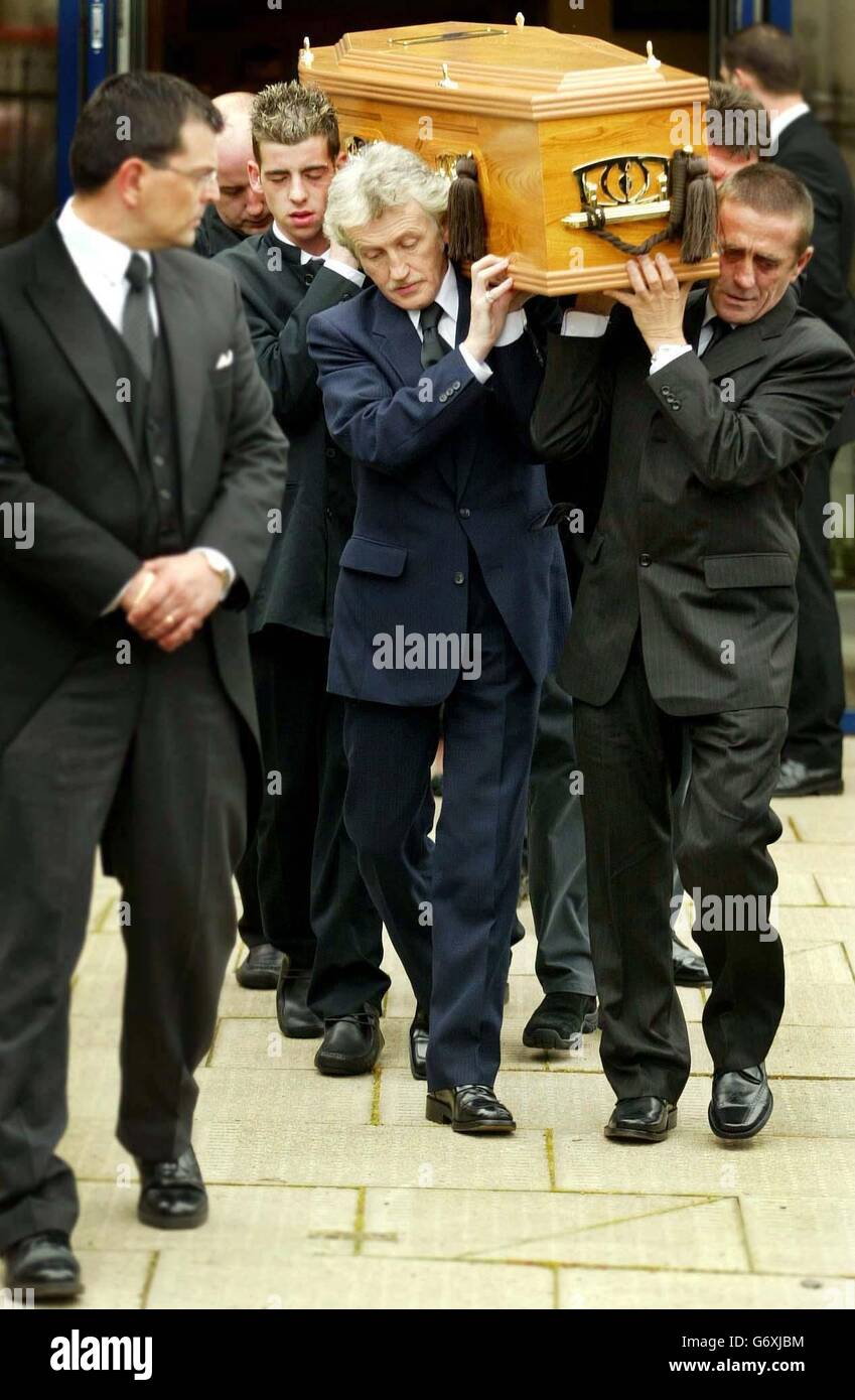 Family and friends of Kriss Donald carry his coffin from the Church of Jesus Christ of Latter Day Saints, in Pollock, Glasgow. Stock Photo