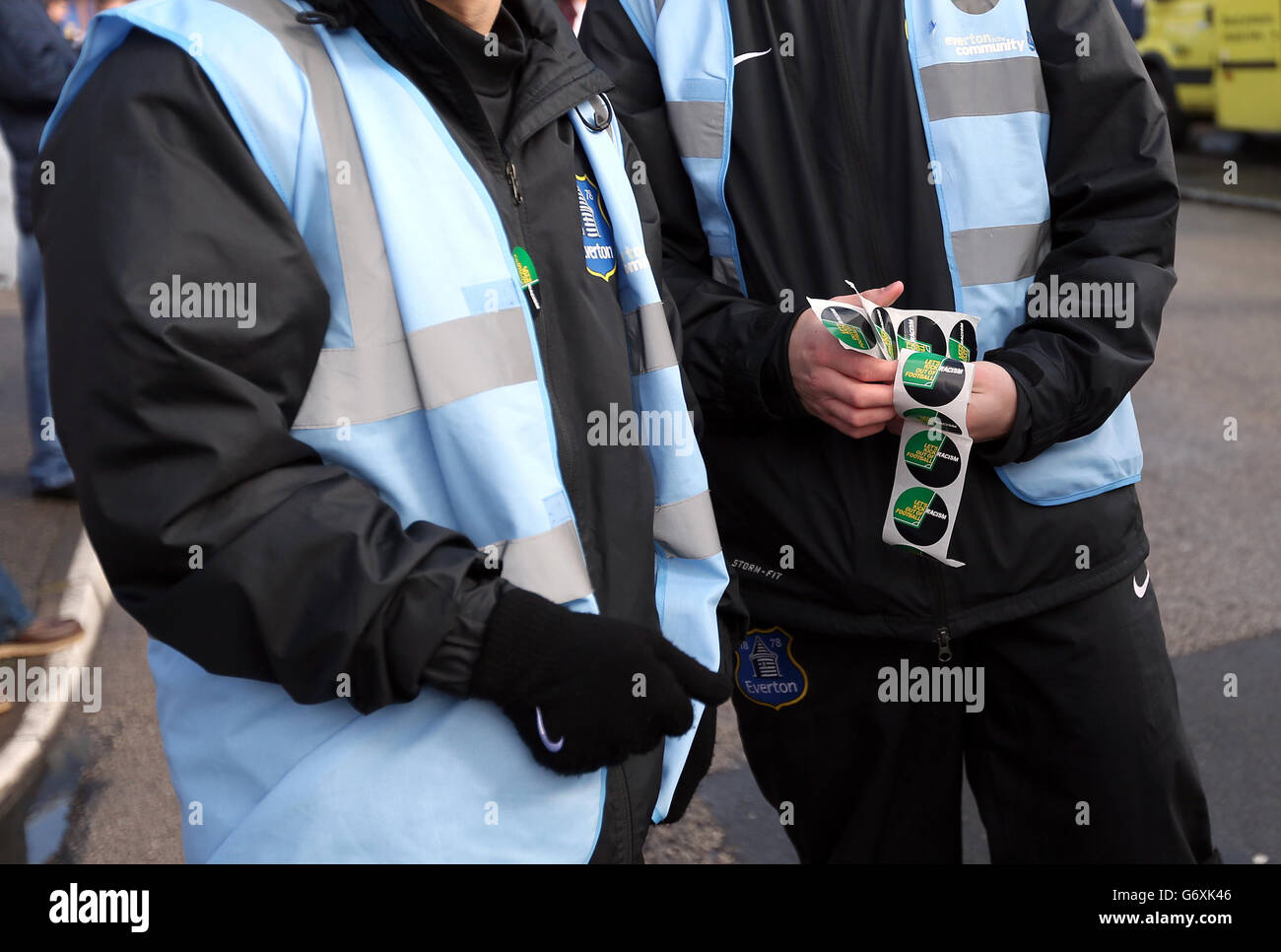 Soccer - Barclays Premier League - Everton v Swansea City - Goodison Park. Lets kick racism out of football stickers being handed out Stock Photo