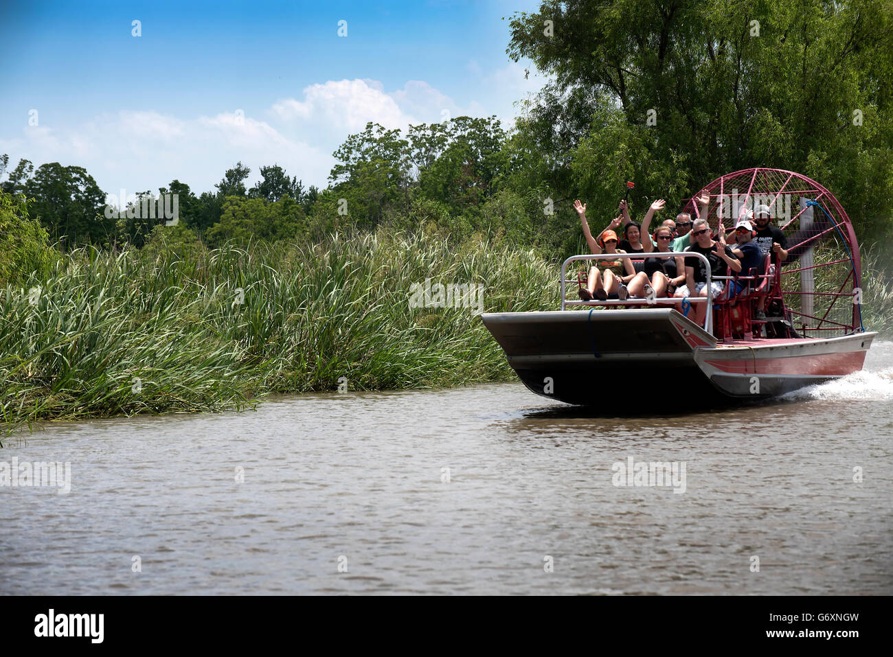 A swamp boat tour of the Bayous outside of New Orleans in Louisiana USA