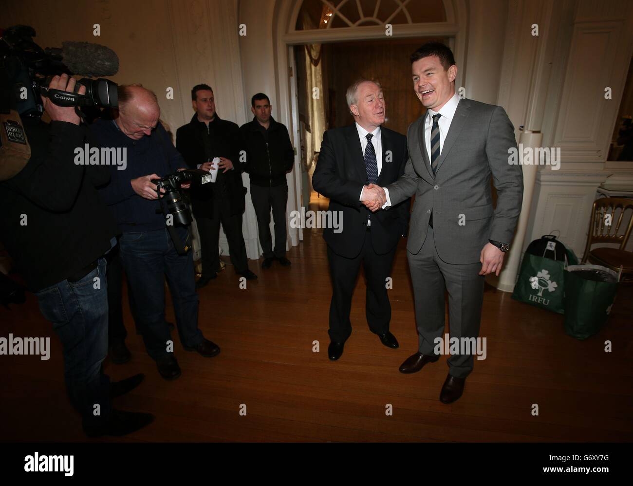 Brian O'Driscoll (right) with Minister of State for Sport Michael Ring during a reception at Farmleigh House, Dublin. Stock Photo